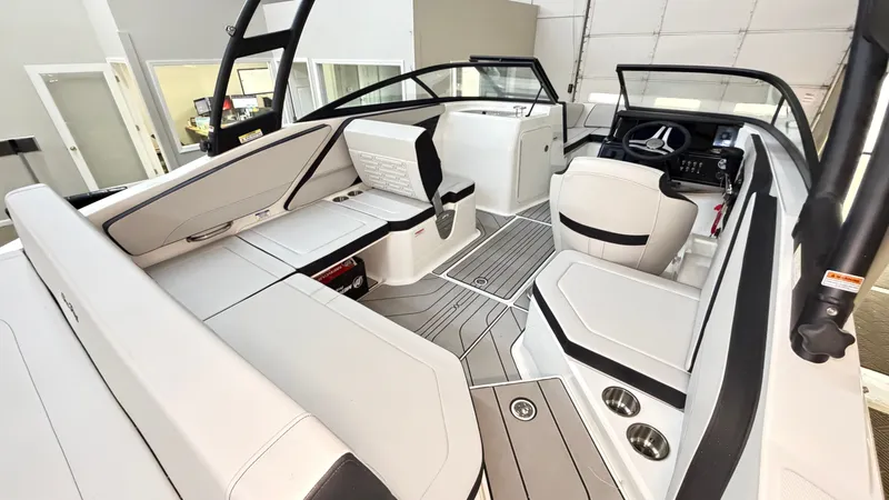 Slide: The Image of Interior of a Sea Ray SPX 210 boat with modern seating and helm console. - 15