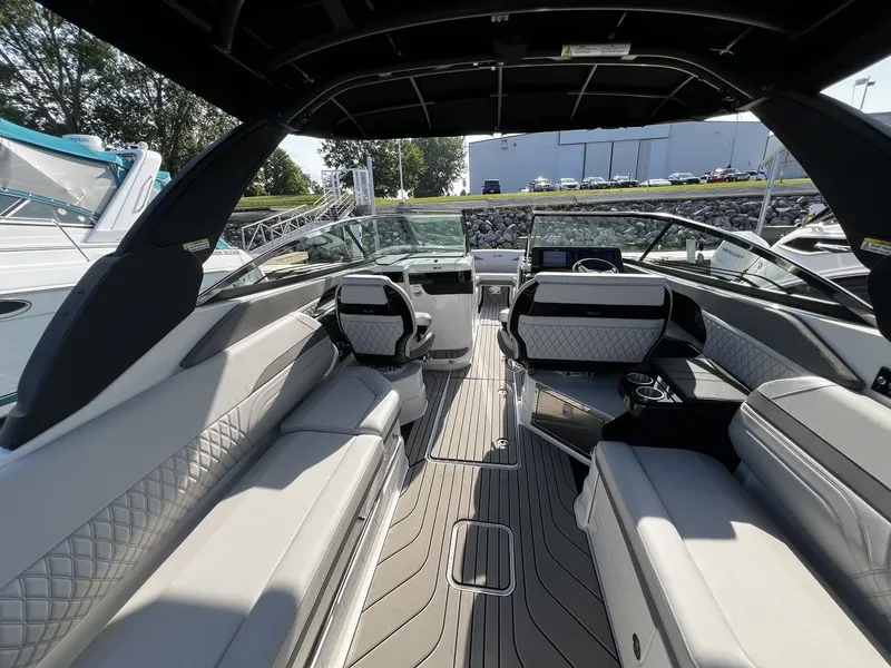 Slide: The Image of Interior view of a 2027 Sea Ray SLX 280 with sleek seating and modern design. - 24