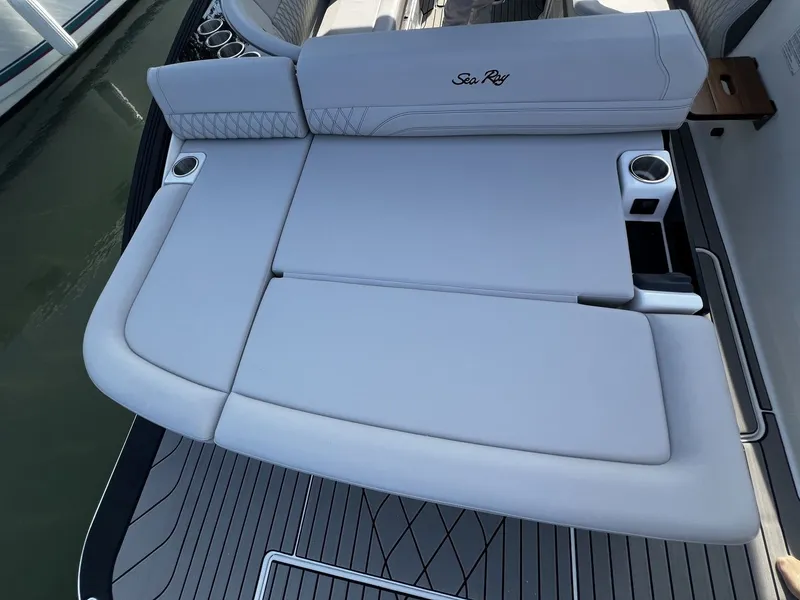 Slide: The Image of The image shows the sunpad of a 2027 Sea Ray SLX 280 boat. - 21