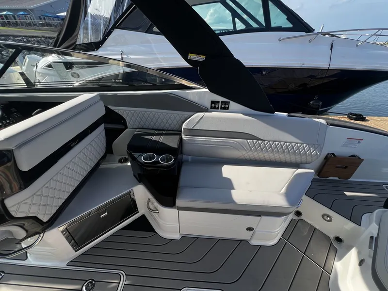 Slide: The Image of The image shows the cockpit of a 2027 Sea Ray SLX 280 with sleek seating and modern details. - 29