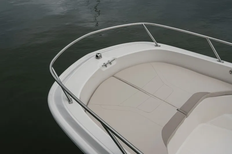 Slide: The Image of The image shows the bow of a 2027 Boston Whaler 160 Super Sport with sleek seating. - 22
