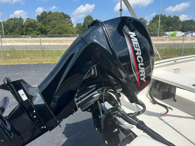 Slide: The Image of A Mercury outboard motor is mounted on a 2027 Boston Whaler 130 Super Sport. - 5