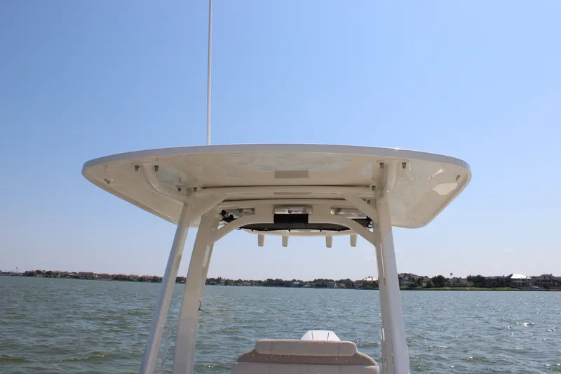 Slide: The Image of A boat with a sturdy T-top on calm waters. - 23