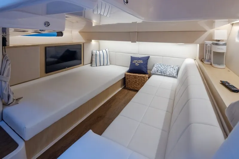 Slide: The Image of Luxurious interior of 2024 Regal 36 Grande Coupe with modern seating and decor. - 10