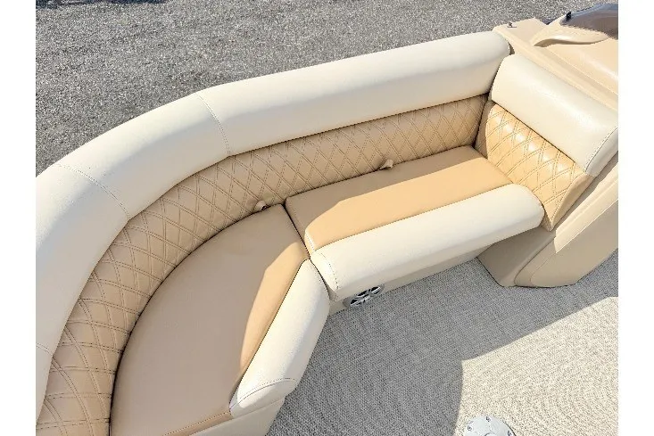 Slide: The Image of 2019 South Bay S224SB225 boat interior with beige quilted seating. - 4
