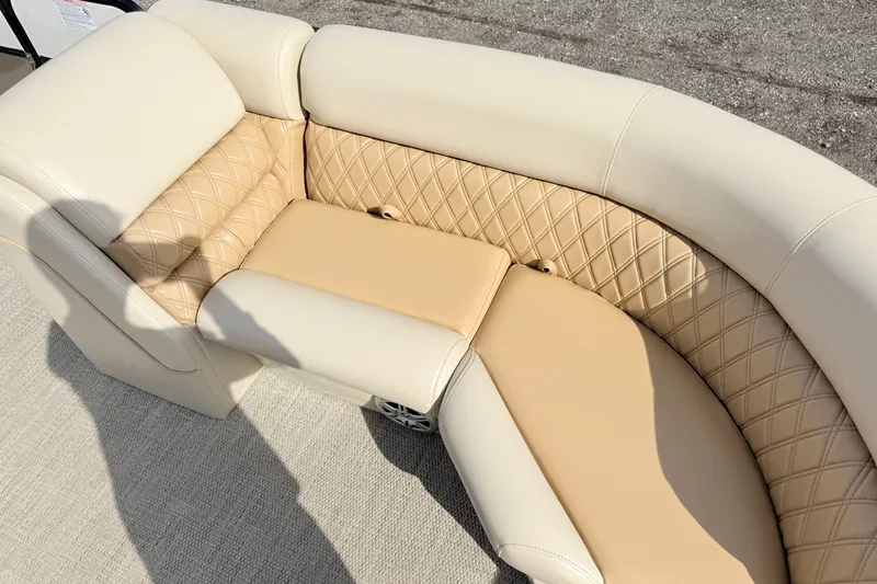 Slide: The Image of Luxurious beige seating on 2019 South Bay S224SB225 pontoon boat, featuring diamond stitching. - 5