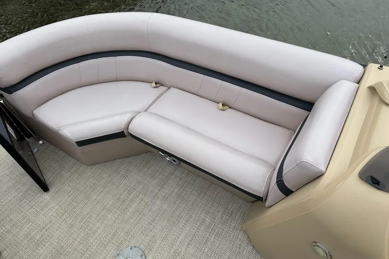 Slide: The Image of The image shows an elegant, cushioned seating area on a boat, overlooking the water. - 9
