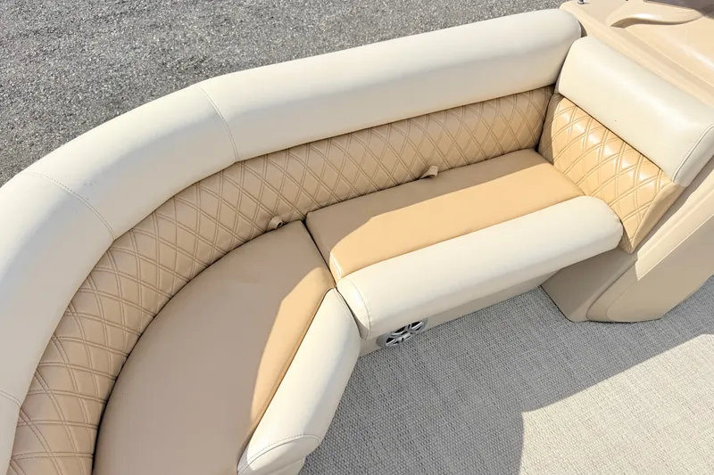 Slide: The Image of Luxurious beige seating on 2019 South Bay S224SB225 pontoon boat, featuring diamond-pattern upholstery. - 3