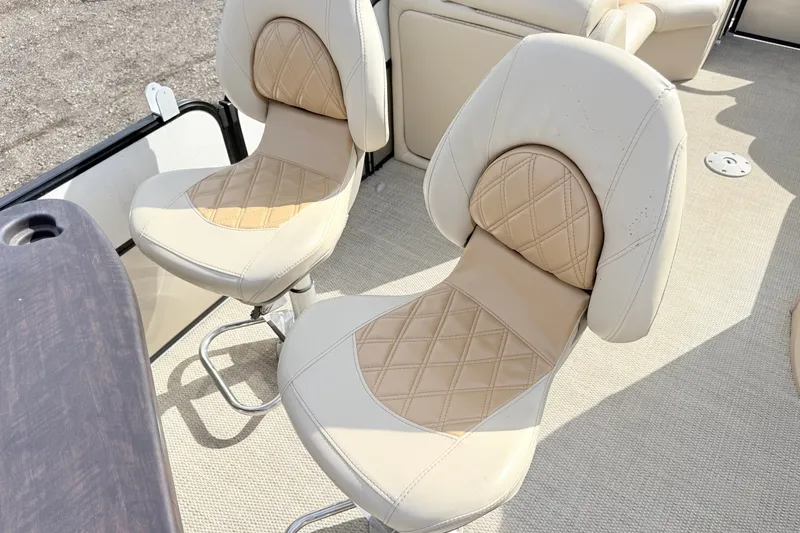 Slide: The Image of 2019 South Bay S224SB225 boat seats with beige diamond-pattern upholstery. - 7