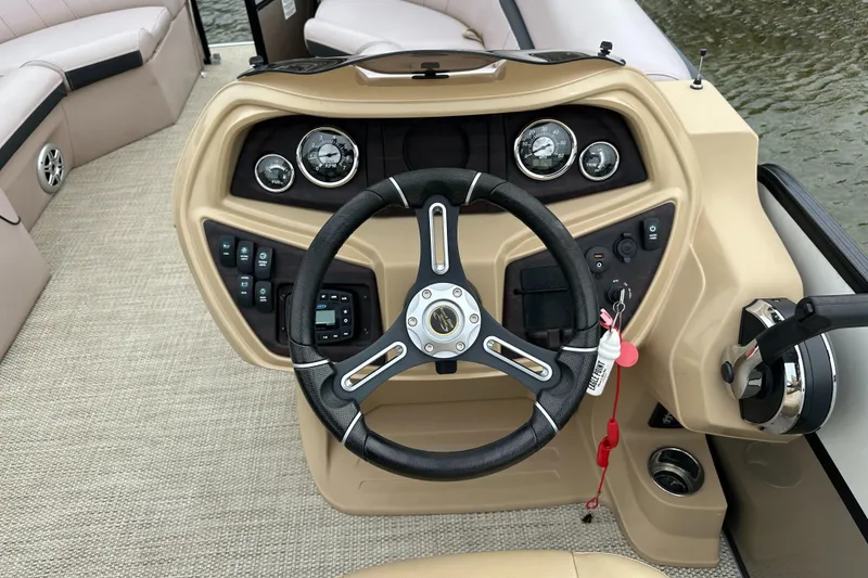 Slide: The Image of Helm of a 2019 South Bay S224SB225 pontoon boat. - 14