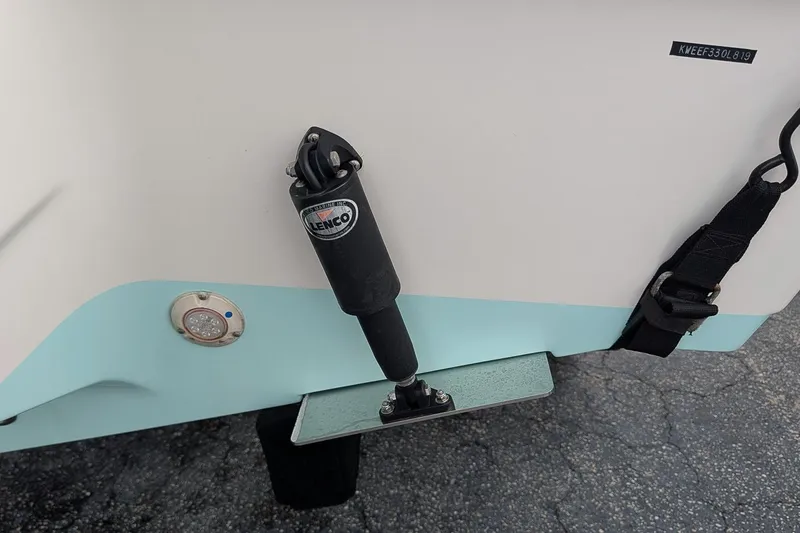 Slide: The Image of 2019 Key West 239 FS boat with Lenco trim tab and strap detail. - 5