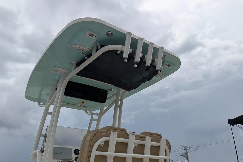 Slide: The Image of 2019 Key West 239 FS boat with T-top against cloudy sky. - 21