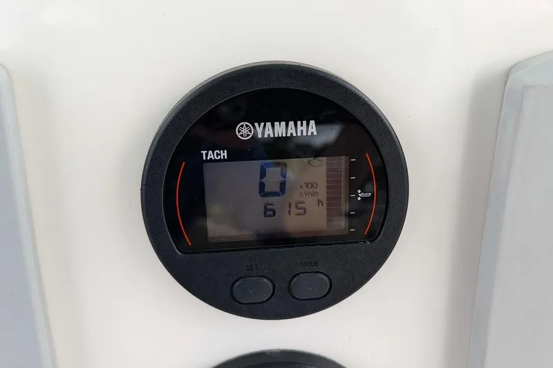 Slide: The Image of Yamaha tachometer on 2019 Key West 239 FS boat, displaying 615 hours. - 12