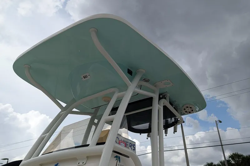 Slide: The Image of 2019 Key West 239 FS boat's T-top under cloudy sky. - 22