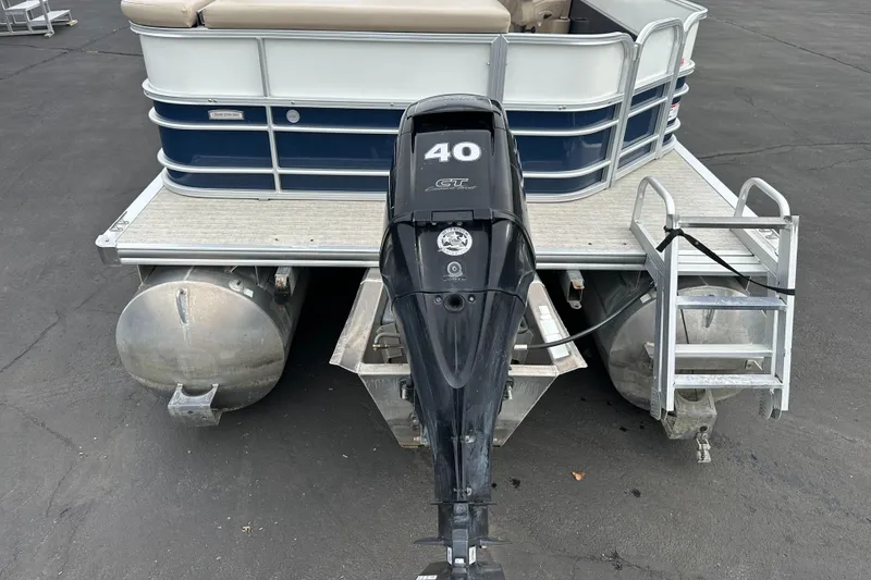 Slide: The Image of A 2018 South Bay S224CR pontoon boat with a 40 HP outboard motor, parked on a lot. - 17