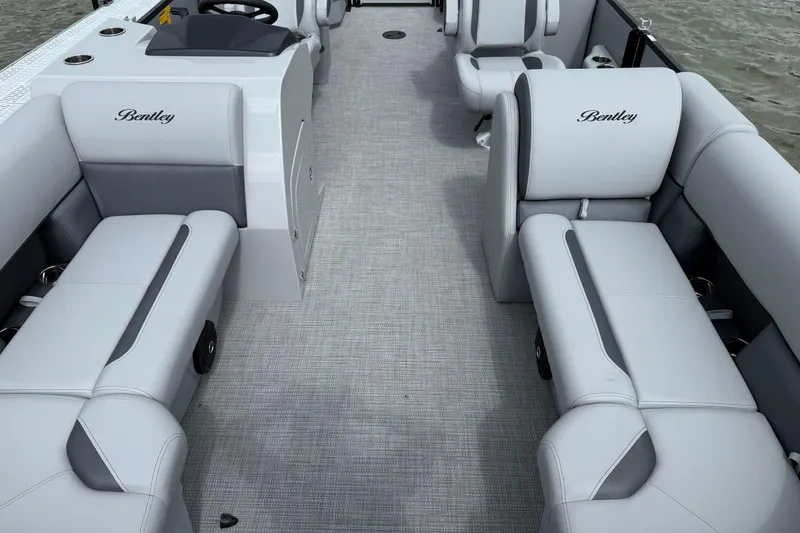 Slide: The Image of 2026 Bentley Pontoons Legacy 220 Navigator interior with luxurious seating and modern design. - 3