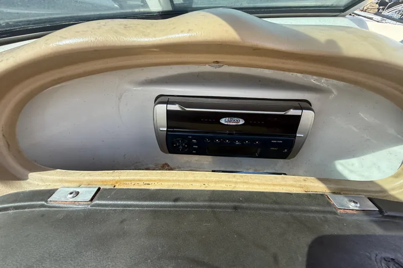 Slide: The Image of 2001 Sea Ray 180 Bow Rider dashboard with Clarion marine stereo system. - 13