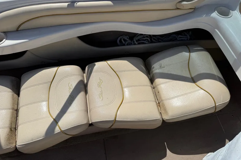 Slide: The Image of Beige leather seats on a 2001 Sea Ray 180 Bow Rider boat. - 9