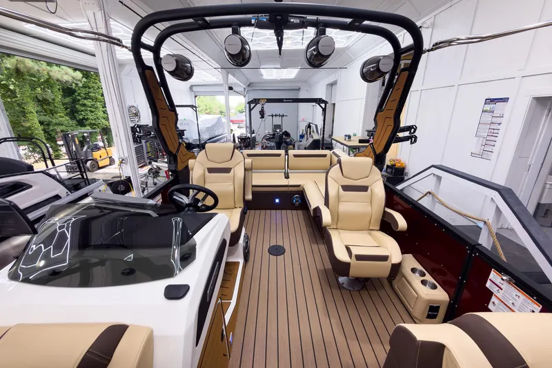 Slide: The Image of Luxurious interior of 2026 Montara Surf Boss EVO - SL 25' boat with plush seating and modern design. - 13