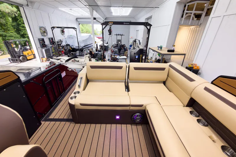 Slide: The Image of Luxurious interior of 2026 Montara Surf Boss EVO - SL 25' in a workshop setting. - 21