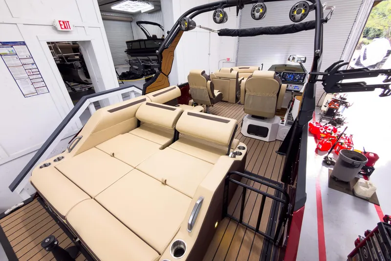 Slide: The Image of Luxurious 2026 Montara Surf Boss EVO - SL 25' boat interior with plush seating and modern controls. - 26