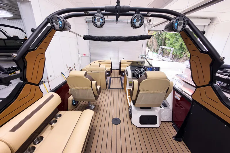 Slide: The Image of Luxurious interior of 2026 Montara Surf Boss EVO - SL 25' boat with modern seating and controls. - 29