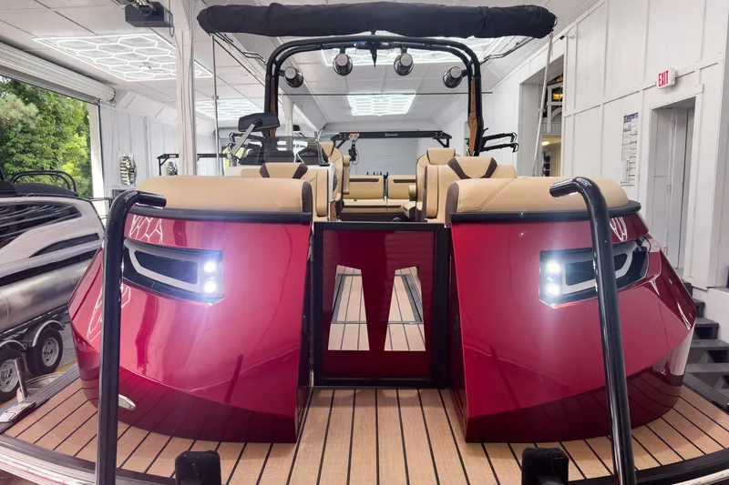 Slide: The Image of 2026 Montara Surf Boss EVO - SL 25' boat with sleek red design and modern seating. - 8