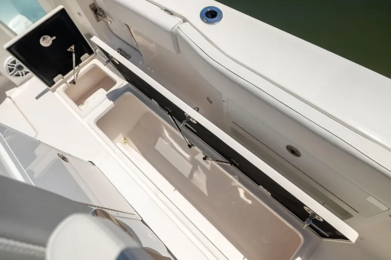 Slide: The Image of The image shows the storage compartment of a Sea Fox 328 Commander boat. - 40