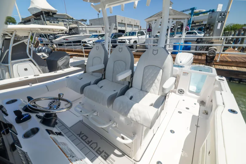 Slide: The Image of 2027 Sea Fox 328 Commander: Luxurious cockpit seating, perfect for comfortable boating. - 30