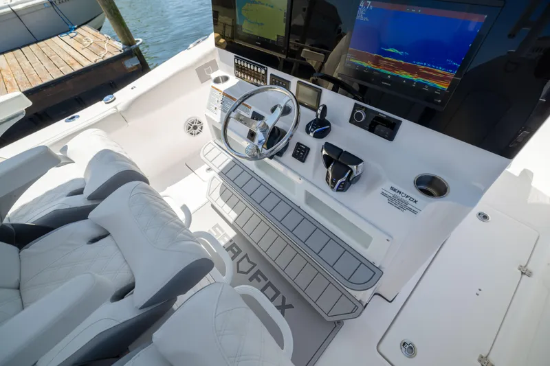 Slide: The Image of The cockpit of the Sea Fox 328 Commander with modern instruments and comfortable seating. - 37