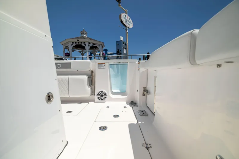 Slide: The Image of The image shows the cockpit of a Sea Fox 328 Commander with white upholstery and a blue sky. - 17