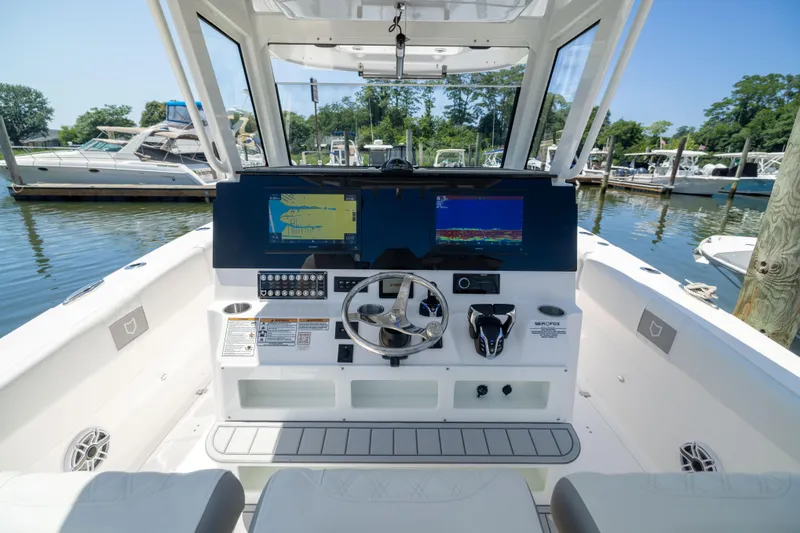 Slide: The Image of The cockpit of the Sea Fox 328 Commander features modern navigation systems and a sleek design. - 16
