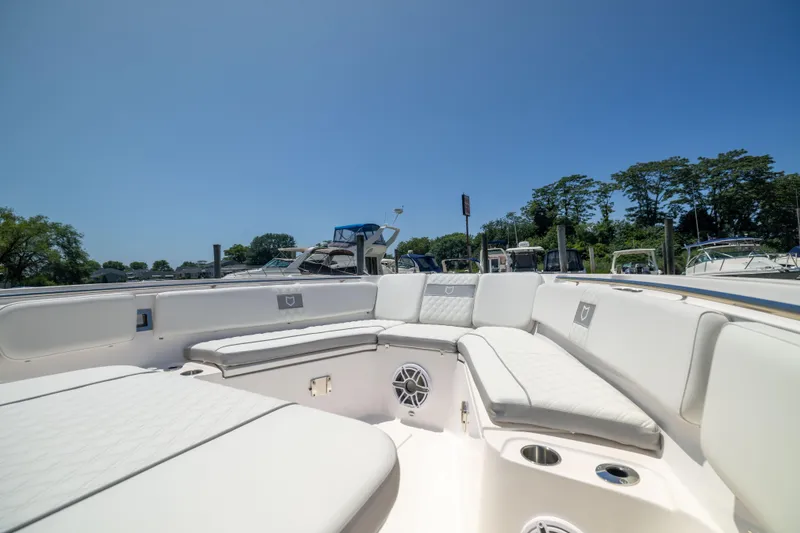 Slide: The Image of The image shows the spacious cockpit of a Sea Fox 328 Commander with white upholstery. - 45