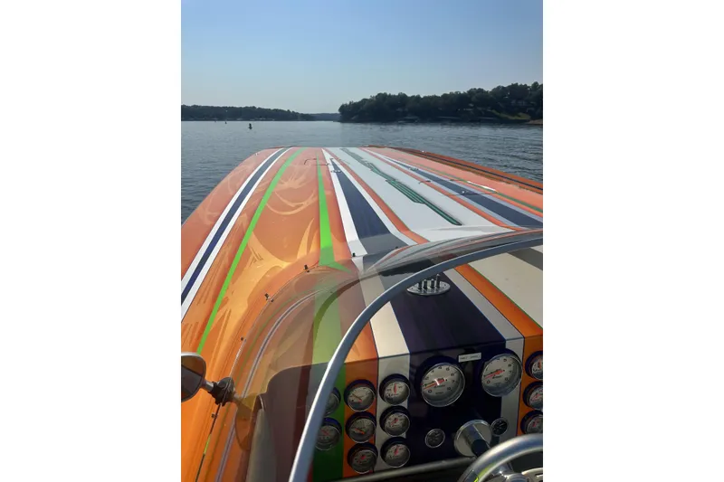 Slide: The Image of Colorful Skater 46 speedboat dashboard on a calm lake, 2013 model. - 7