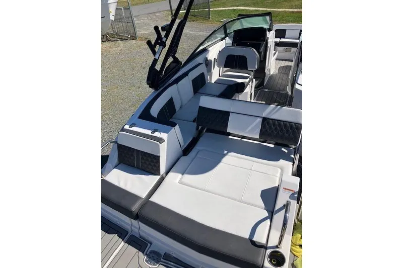 Slide: The Image of 2024 Monterey M-65 boat interior with luxurious seating and modern design. - 8