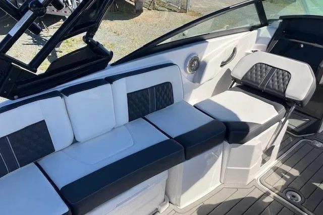 Slide: The Image of 2024 Monterey M-65 boat interior with sleek seating and modern design. - 11