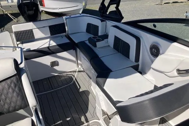 Slide: The Image of 2024 Monterey M-65 boat interior with sleek seating and modern design. - 16