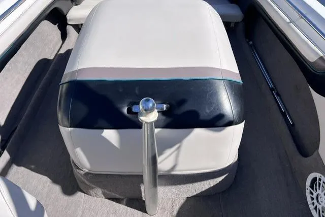 Slide: The Image of 1996 MasterCraft ProStar 190 interior with cushioned seating and sleek design. - 12