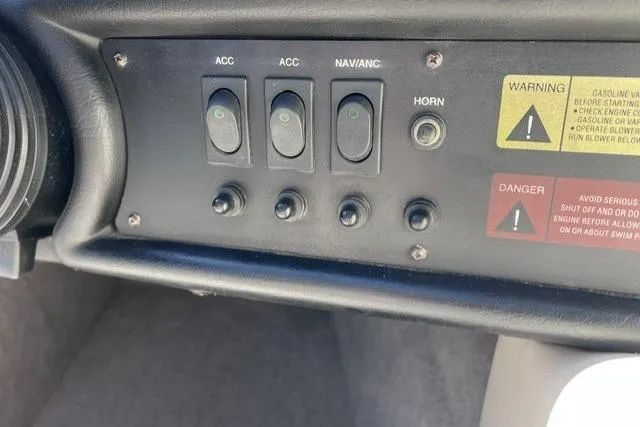 Slide: The Image of 1996 MasterCraft ProStar 190 dashboard controls with warning labels and switches. - 15
