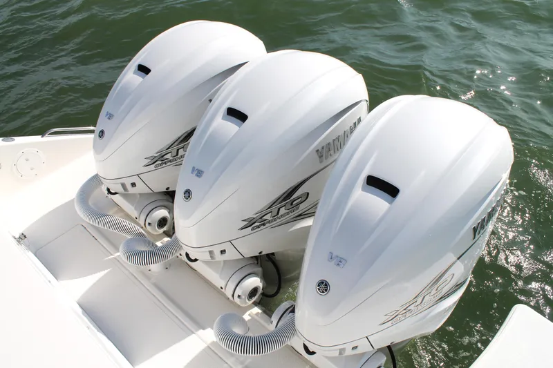 Slide: The Image of Triple Yamaha V8 outboard engines on 2023 Pursuit S 378 Sport boat. - 12