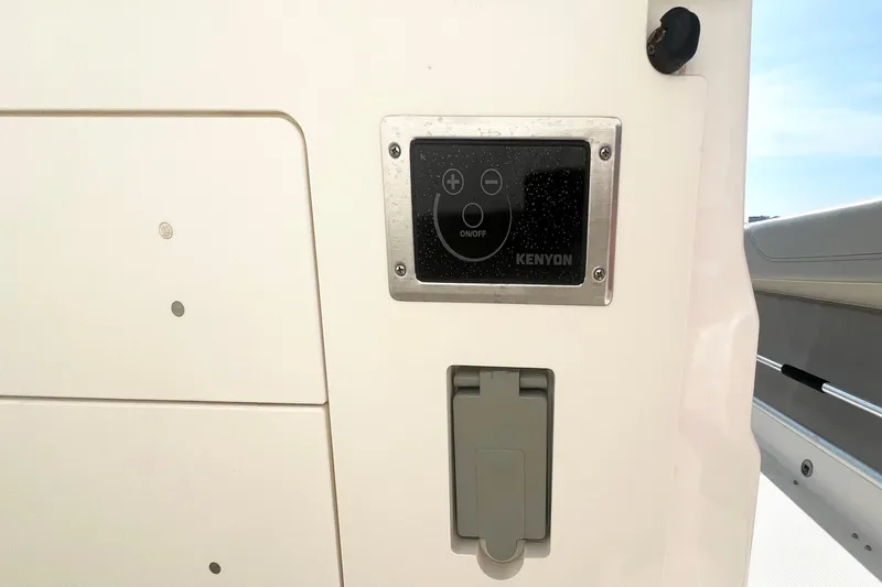 Slide: The Image of Control panel on 2023 Pursuit S 378 Sport boat, featuring Kenyon interface. - 18