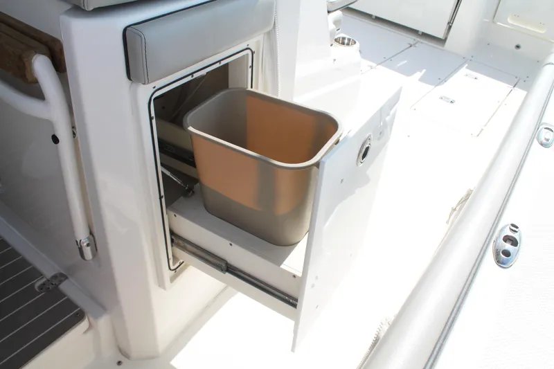 Slide: The Image of 2023 Pursuit S 378 Sport boat with built-in trash compartment. - 32