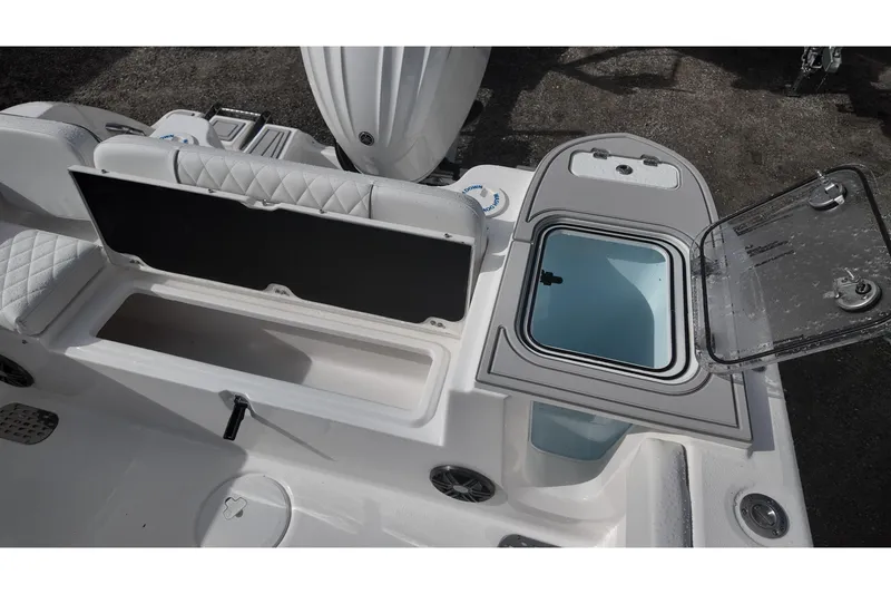 Slide: The Image of 2026 Sea Fox 248 Commander boat interior with open storage compartments and seating. - 13