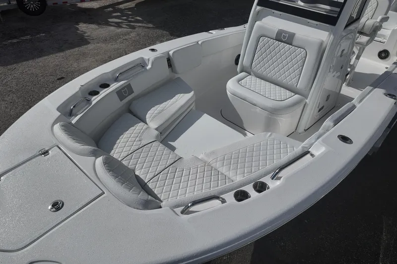 Slide: The Image of 2026 Sea Fox 248 Commander boat interior with cushioned seating and sleek design. - 8