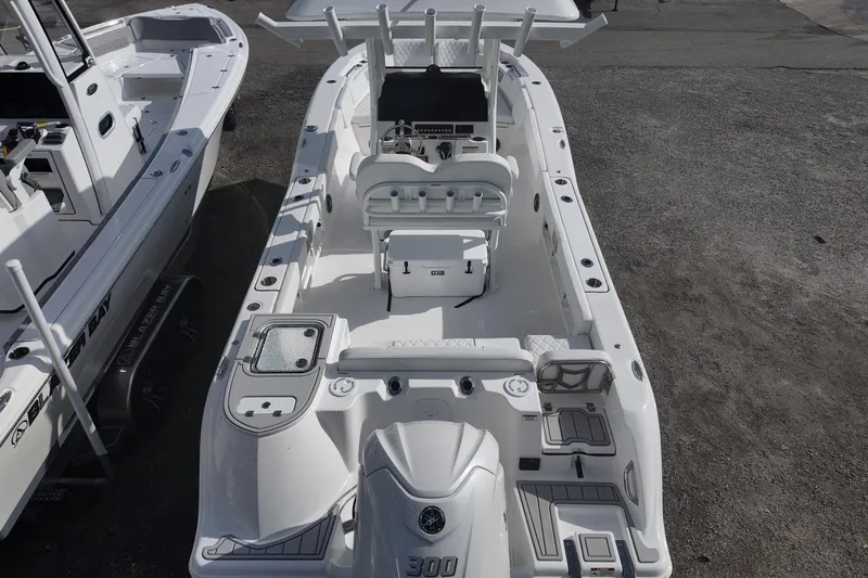 Slide: The Image of 2026 Sea Fox 248 Commander boat, aerial view, showcasing spacious deck and seating arrangement. - 14