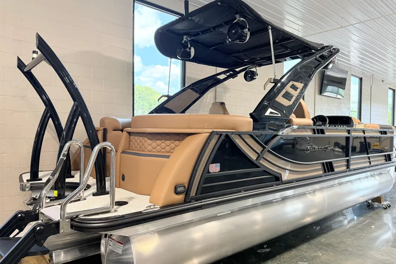 Slide: The Image of 2026 South Bay 525RS DC pontoon boat with sleek design and luxurious seating. - 8