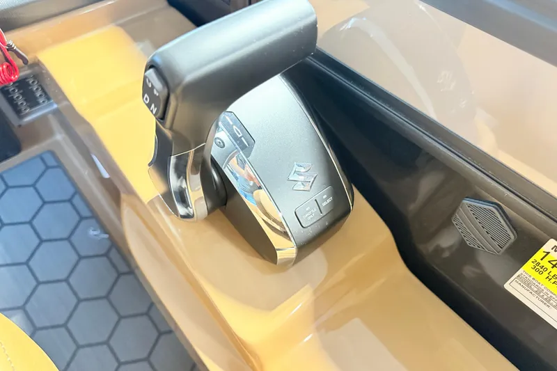 Slide: The Image of Close-up of 2026 South Bay 525RS DC boat throttle control. - 19