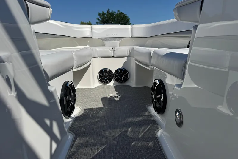 Slide: The Image of 2018 Formula 270 Bowrider interior with cushioned seating and built-in speakers. - 20