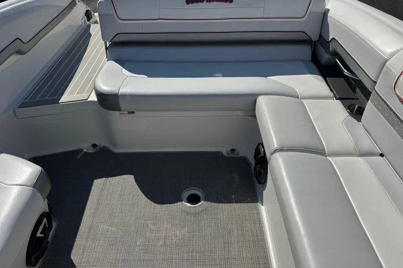 Slide: The Image of 2018 Formula 270 Bowrider interior with gray seating and carpeted floor. - 8