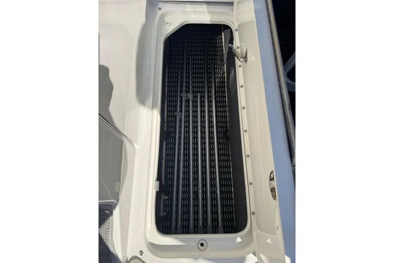 Slide: The Image of Storage compartment of a 2018 Formula 270 Bowrider boat, featuring a sleek design. - 14